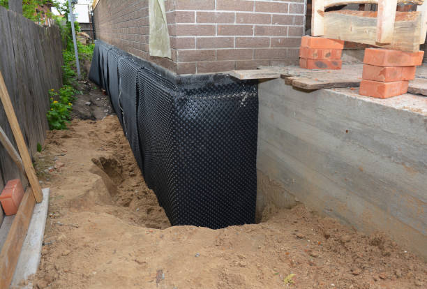 SJ Waterproofing Pros technician performing targeted Waterproofing assessment in Spotswood, NJ